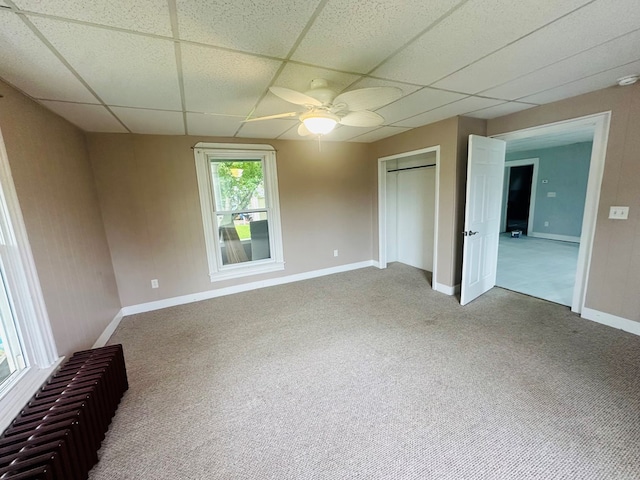 228 Willow St, Athens, PA 18810 - unfurnished bedroom with a drop ceiling, carpet, a ceiling fan, a closet, and baseboards