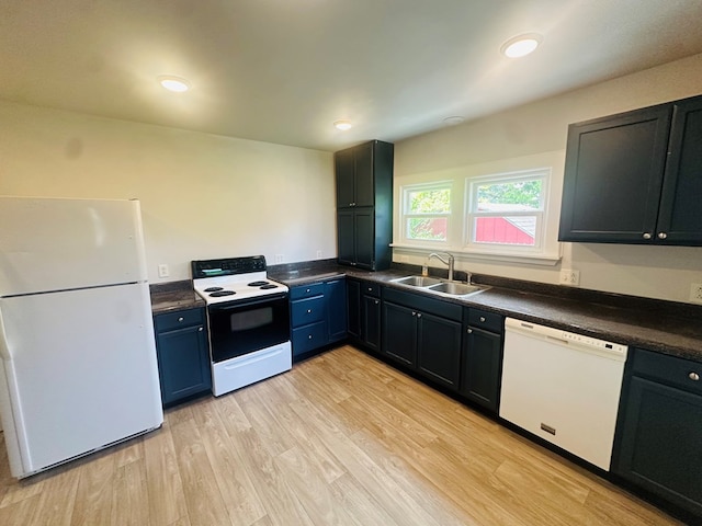 228 Willow St, Athens, PA 18810 - kitchen with white appliances, a sink, dark countertops, light wood-style flooring, and recessed lighting