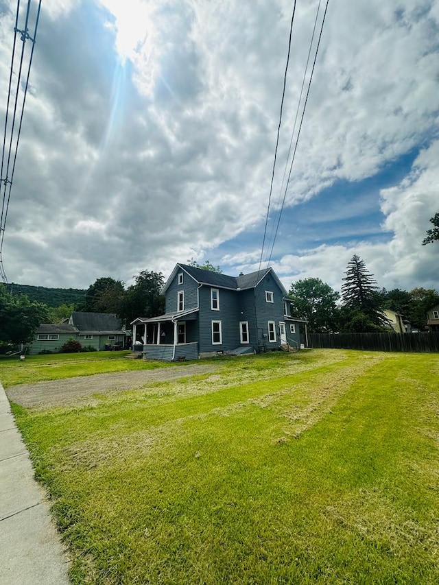 228 Willow St, Athens, PA 18810 - view of side of property with gravel driveway and a sunroom