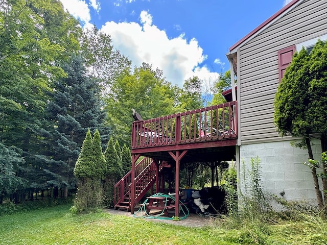 view of yard featuring a wooden deck