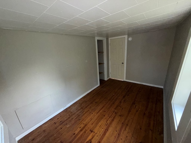 321/2 Pine St, Waverly, NY 14892 - spare room with dark wood-type flooring and baseboards
