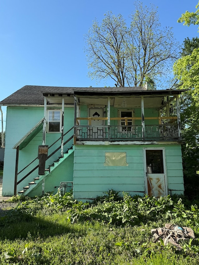 321/2 Pine St, Waverly, NY 14892 - back of house with stairway and a balcony