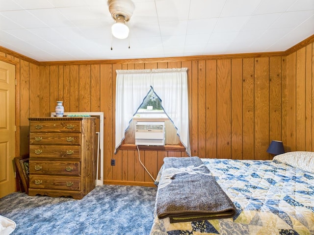 40 W Hebron Rd, Coudersport, PA 16915 - carpeted bedroom with wooden walls, cooling unit, and a ceiling fan