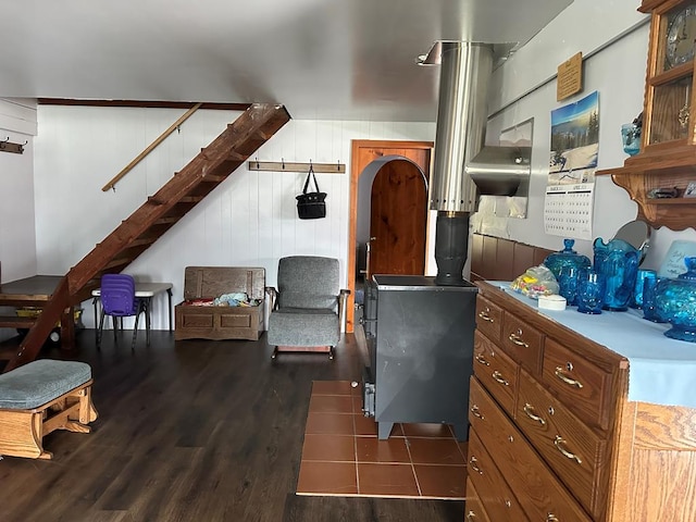 bedroom with dark hardwood / wood-style flooring