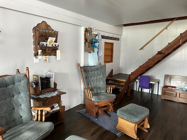 sitting room with hardwood / wood-style flooring