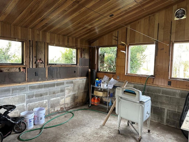 miscellaneous room featuring vaulted ceiling and wood ceiling