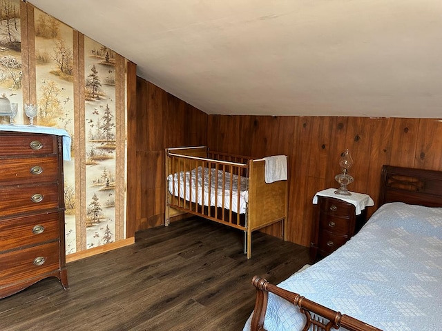 bedroom featuring dark hardwood / wood-style flooring