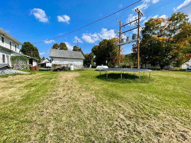 view of yard featuring a trampoline