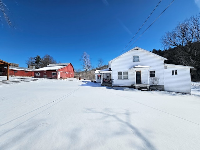 view of front facade featuring a barn