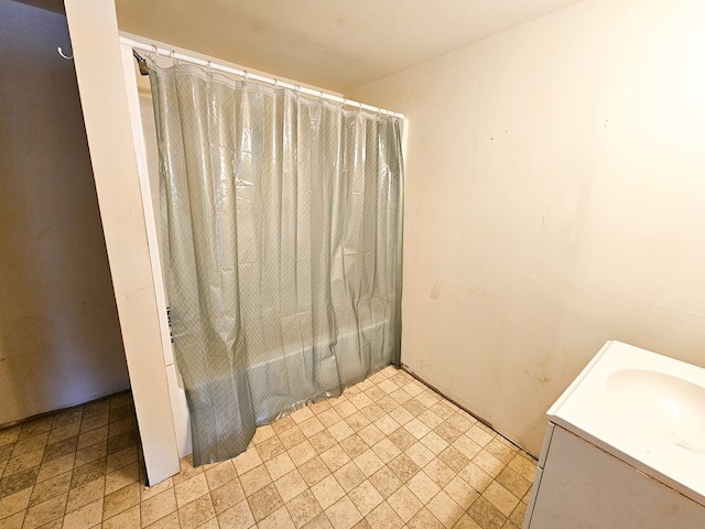 full bathroom with shower / bath combo and a sink