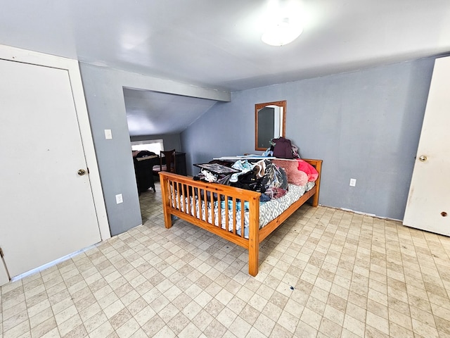 bedroom featuring light floors