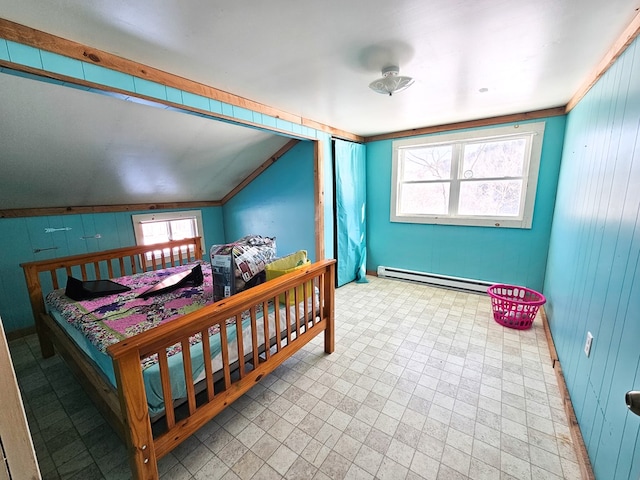 bedroom featuring lofted ceiling, light floors, wooden walls, and baseboard heating