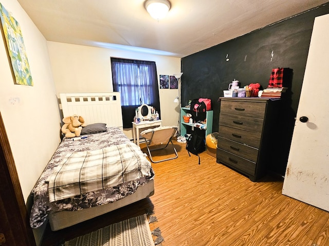 bedroom featuring light wood-type flooring