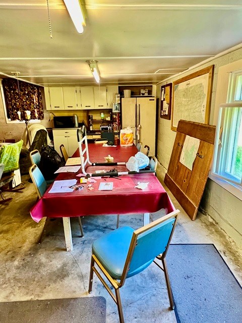 dining space featuring a workshop area