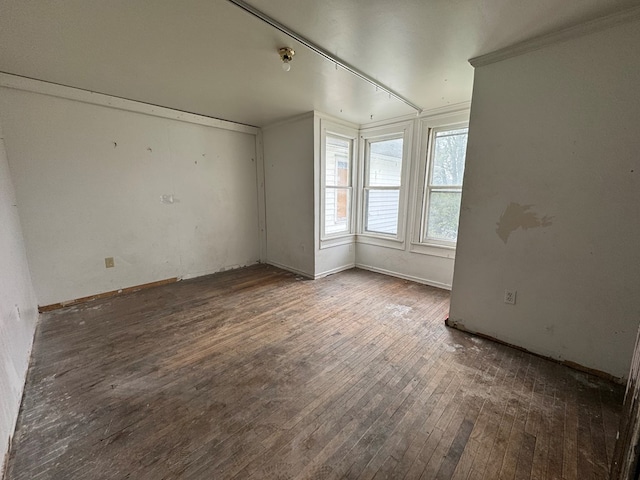 unfurnished room featuring dark hardwood / wood-style floors