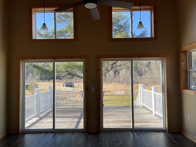 1571 State Route 44n, Coudersport, PA 16915 - doorway featuring baseboards, ceiling fan, a high ceiling, and wood finished floors