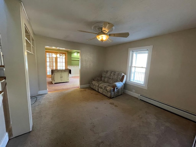 1571 State Route 44n, Coudersport, PA 16915 - living area featuring baseboards, carpet flooring, and a ceiling fan