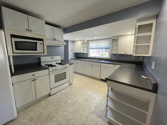 1571 State Route 44n, Coudersport, PA 16915 - kitchen featuring open shelves, white appliances, dark countertops, a sink, and recessed lighting