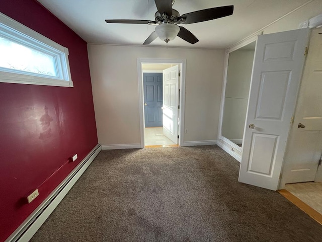 1571 State Route 44n, Coudersport, PA 16915 - unfurnished bedroom with carpet, baseboard heating, baseboards, ceiling fan, and connected bathroom