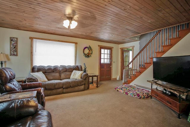 living room with carpet, ceiling fan, baseboard heating, and wooden ceiling