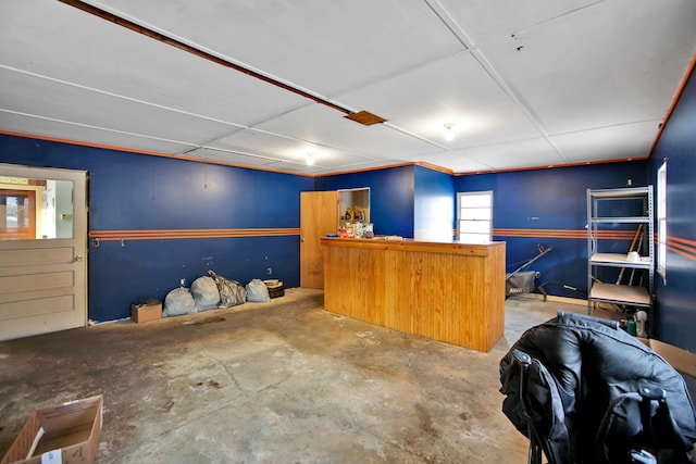 bar featuring concrete floors