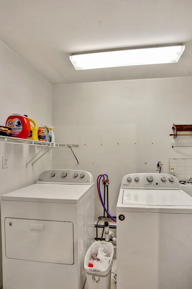 laundry area featuring washing machine and dryer