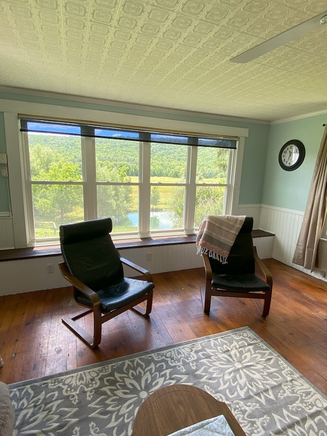 sitting room with hardwood / wood-style floors