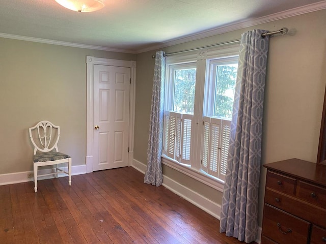 unfurnished bedroom featuring dark hardwood / wood-style floors and crown molding