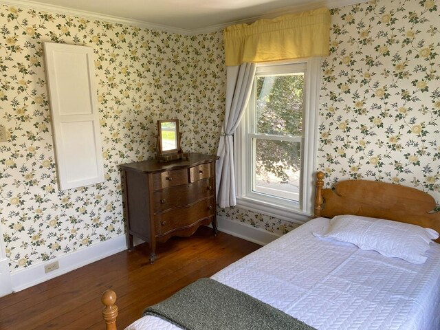17800 Rte 6, Towanda, PA 18848 - bedroom featuring wallpapered walls, baseboards, dark wood finished floors, ornamental molding, and multiple windows
