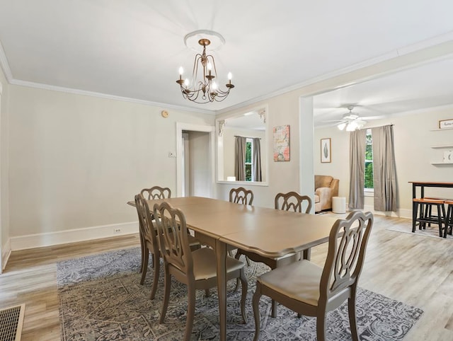 17800 Rte 6, Towanda, PA 18848 - dining area with light wood-style flooring, baseboards, a chandelier, crown molding, and ceiling fan
