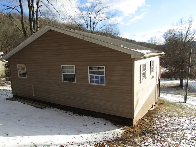 view of snow covered property