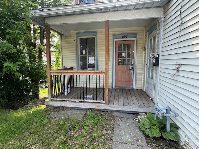 207 William St, Towanda, PA 18848 - view of exterior entry featuring covered porch