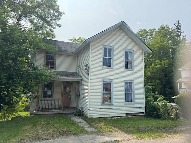 207 William St, Towanda, PA 18848 - traditional-style home featuring a porch and a shingled roof
