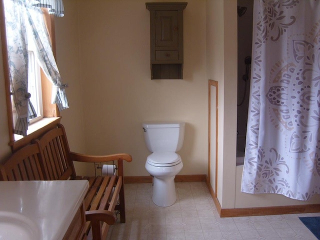 484 French Hill Rd, Middlebury Center, PA 16935 - full bathroom featuring shower / bath combination with curtain, toilet, and baseboards