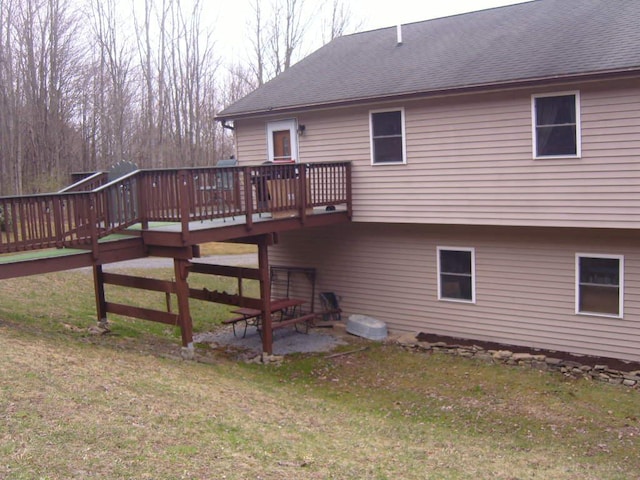 484 French Hill Rd, Middlebury Center, PA 16935 - back of property with a wooden deck, a lawn, and roof with shingles