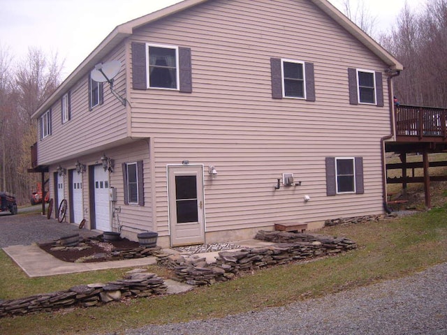 484 French Hill Rd, Middlebury Center, PA 16935 - rear view of property with an attached garage and a deck