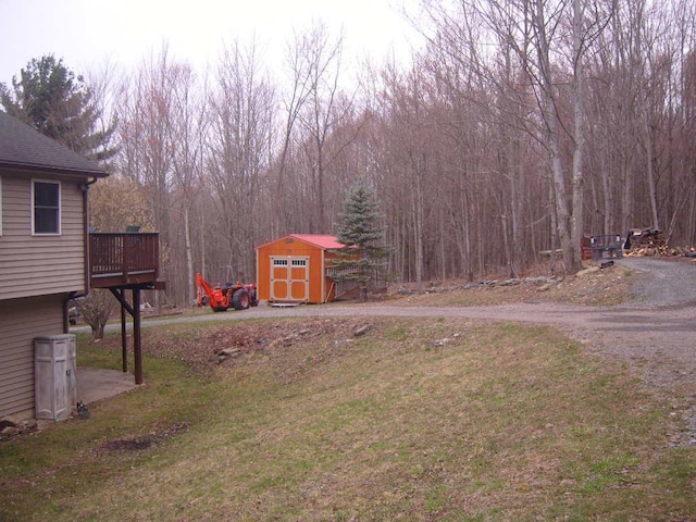 484 French Hill Rd, Middlebury Center, PA 16935 - view of yard featuring a deck, an outbuilding, and a shed