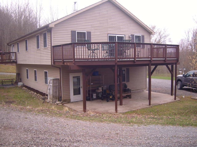 484 French Hill Rd, Middlebury Center, PA 16935 - back of house with a wooden deck and a patio