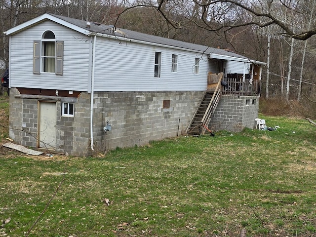 296 Low St, Shinglehouse, PA 16748 - back of property featuring stairway and a lawn