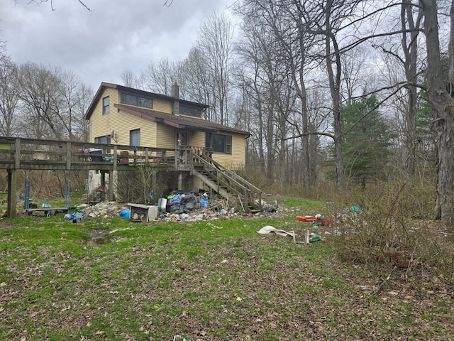 296 Low St, Shinglehouse, PA 16748 - back of property with a chimney, a wooden deck, and stairs