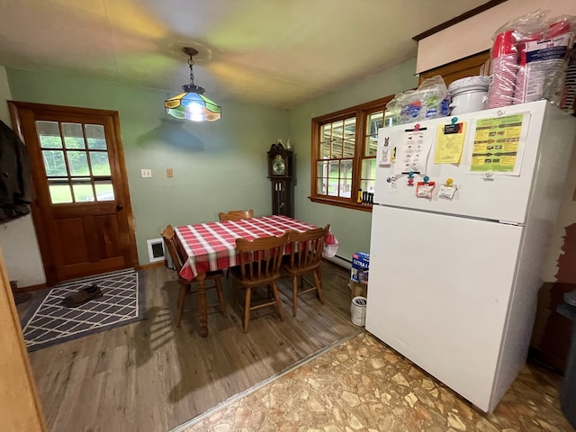 286 Hidden Hollow Farm Dr, Austin, PA 16720 - dining room with plenty of natural light, baseboard heating, and wood finished floors