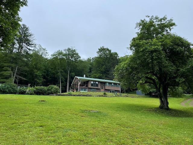 286 Hidden Hollow Farm Dr, Austin, PA 16720 - view of front of property featuring a front lawn and a wooded view