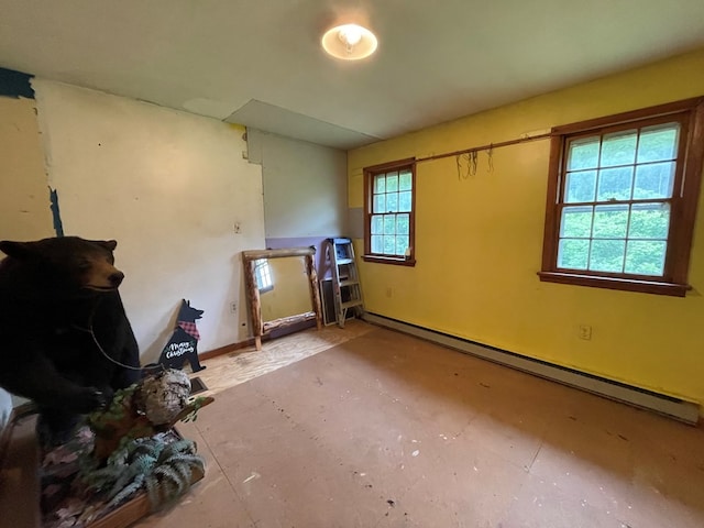 286 Hidden Hollow Farm Dr, Austin, PA 16720 - unfurnished room featuring a baseboard radiator and baseboards