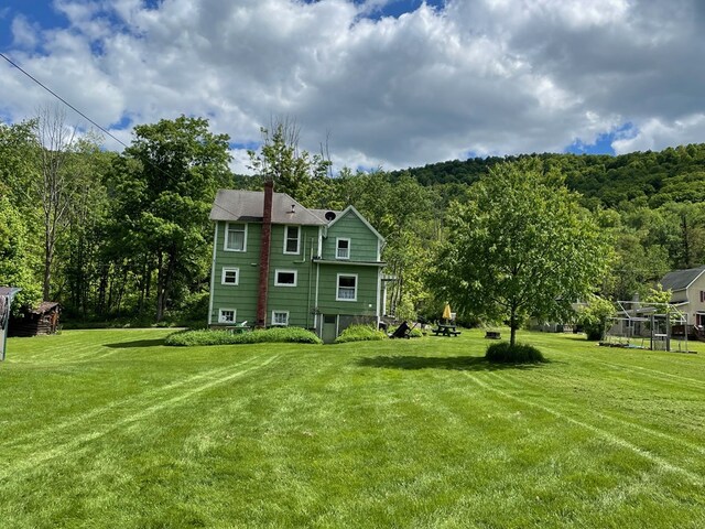 115 Pine St, Galeton, PA 16922 - view of grassy yard with a forest view