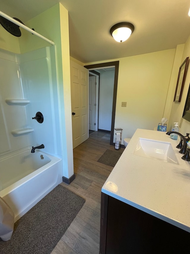 115 Pine St, Galeton, PA 16922 - full bath featuring wood finished floors, vanity, and shower / bath combination