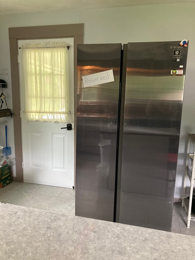 115 Pine St, Galeton, PA 16922 - kitchen with freestanding refrigerator and tile patterned floors
