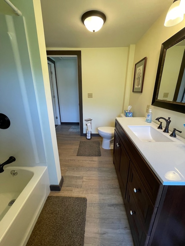 115 Pine St, Galeton, PA 16922 - bathroom featuring vanity, wood finished floors, and bathtub / shower combination