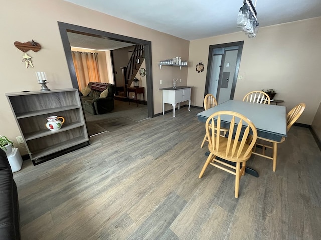 115 Pine St, Galeton, PA 16922 - dining space featuring wood finished floors and stairs