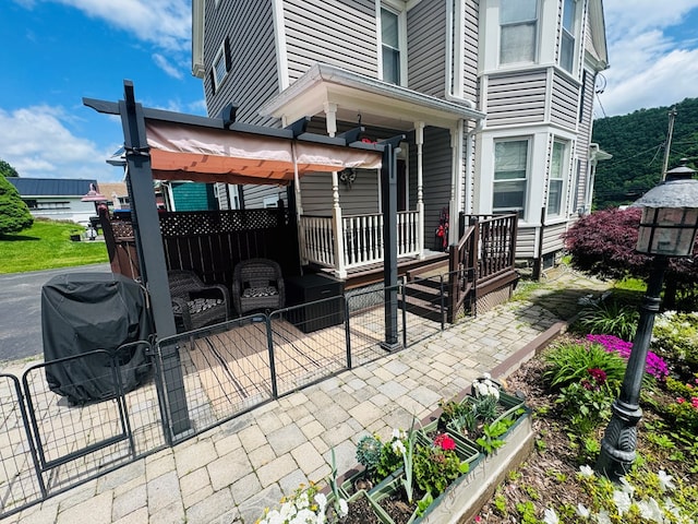view of patio with a grill