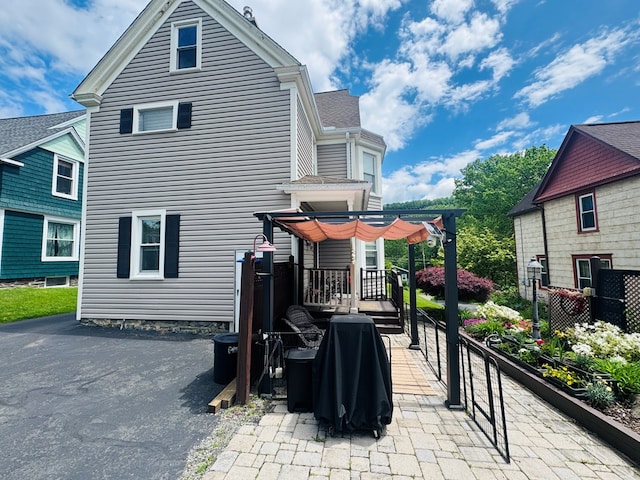 view of patio / terrace featuring a pergola and a deck